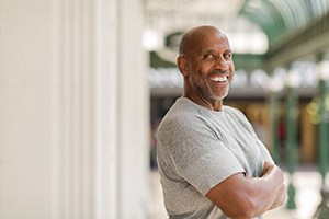 Smiling man with dental bridges in Plano