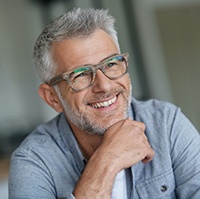 smiling older man with glasses