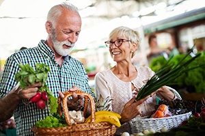 a couple eating healthy for dental implant care in Plano