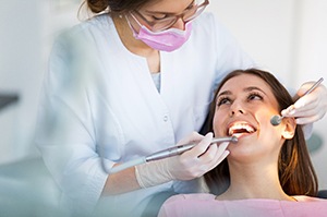 patient visiting dentist for dental implant care in Plano