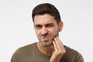 man with jaw pain